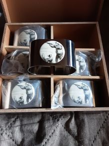 set of boxed hunting scene napkin rings