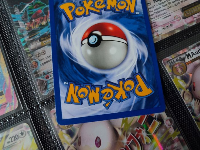Ekans ! FIRST EDITION ! Rare Near Mint- Mint Condition ! from Team Rocket Set ! 2000 ! Pokemon Card !