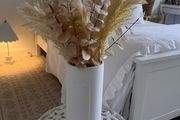 modern vase with grasses