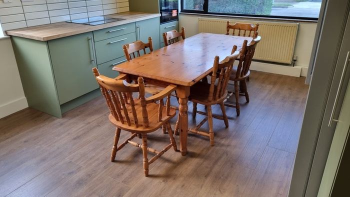 Soid Pine kitchen table and 6 chairs, 2 are 'Carvers' (with arms) and 4 are standard.