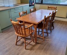 Soid Pine kitchen table and 6 chairs, 2 are 'Carvers' (with arms) and 4 are standard.