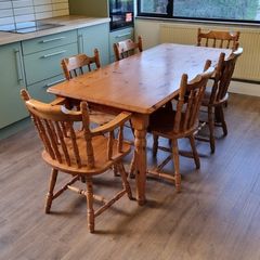 Soid Pine kitchen table and 6 chairs, 2 are 'Carvers' (with arms) and 4 are standard.