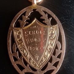 Antique 9ct rose gold school rugby shield pendant
