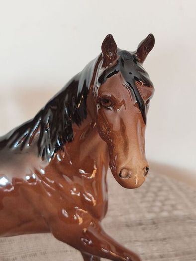 Vintage Royal Doultot porcelain horse. new in the box.