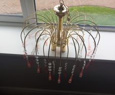 vintage 1970s Hollywood Regency "Waterfall" style fixtures with Murano glass teardrop pendants.