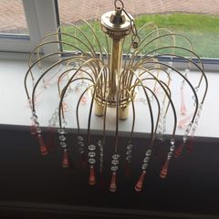 vintage 1970s Hollywood Regency "Waterfall" style fixtures with Murano glass teardrop pendants.