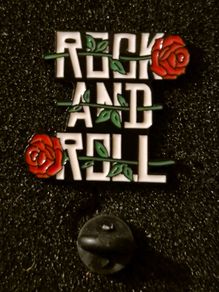 Rock and roll, pin back badge.