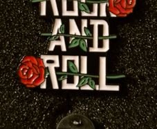 Rock and roll, pin back badge.