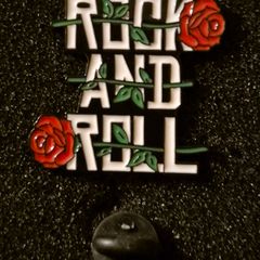 Rock and roll, pin back badge.