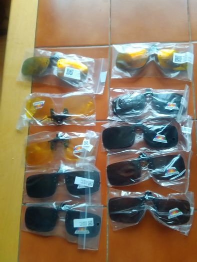 New clipon sunglasses. Brown green yellow grey