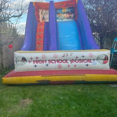 large bouncy castle with slide