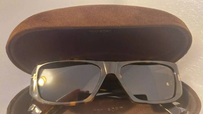 genuine Tom Ford sunglasses , those ultra luxury, head-turning
