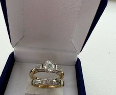 Engagement ring and diamond and gold wedding band