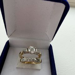 Engagement ring and diamond and gold wedding band
