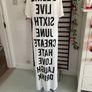 long tunic with side slits Bnwt.  Short sleeve white with black logo Image 4