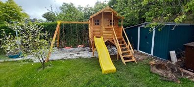 Wooden Treehouses with slide and 2 swings