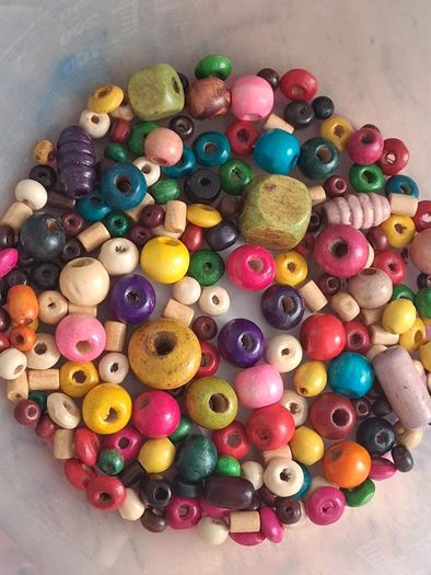 Stunning mixed style and colour wooden bead bundle of approx 150 beads.