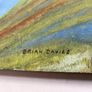 picture This piece depicts a railway line sweeping around a coastal bay beneath a footbridge and hillsides, signed Brian Davies in the lower left corner. Image 2
