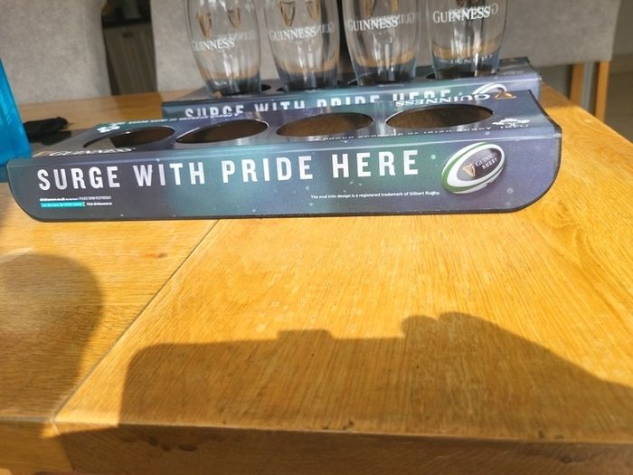 guinness rugby glass holder with 4 pint glasses
