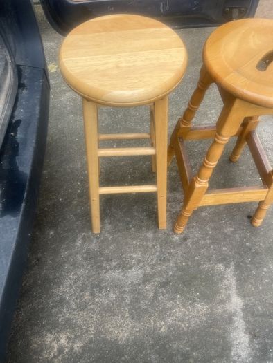 2 solid wood bar stools.