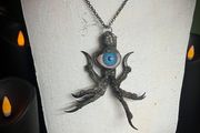 Protective Raven Claws Soldered with a Prosthetic Blue Eye Talisman