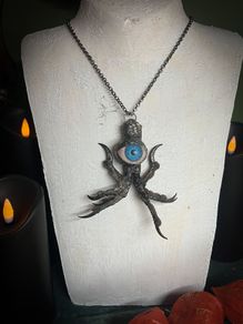 Protective Raven Claws Soldered with a Prosthetic Blue Eye Talisman