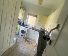 Utility cupboards and work top and sink and drain