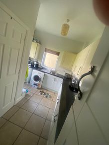 Utility cupboards and work top and sink and drain