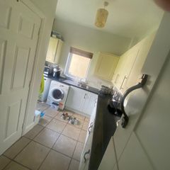 Utility cupboards and work top and sink and drain