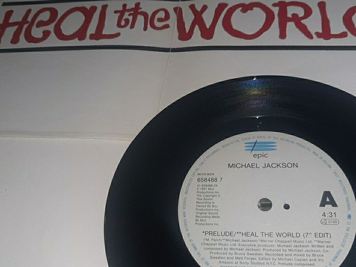 record heal the world single