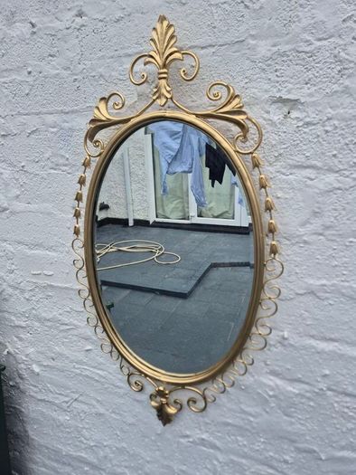 A Mirror Large heavy Vintage Rococo design filly bevelled oval Mirror