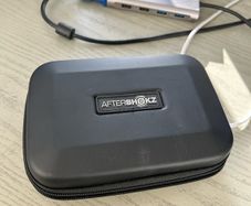 Aftershokz Bone Conduction wired.