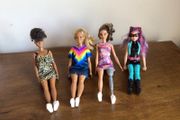4 Barbie Dolls