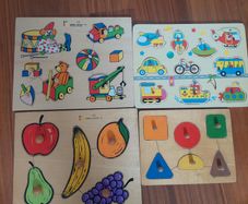 Set of 4 wooden peg puzzles