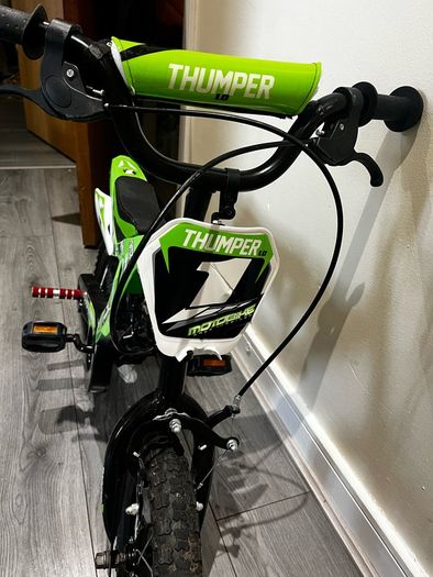 Boys green bike