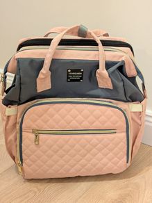 Baby diaper bag with built in changing station