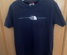 Navy North Face short sleeved T-shirt size Small (7-8 years)