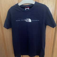 Navy North Face short sleeved T-shirt size Small (7-8 years)