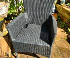 Black rattan garden chairs
