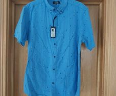 New Mens shirt with tags.