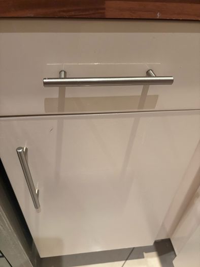 Fitted kitchen. Light cream high gloss kitchen