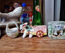 2 donkey ornaments and a basket
