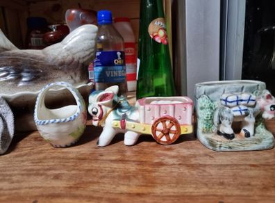 2 donkey ornaments and a basket