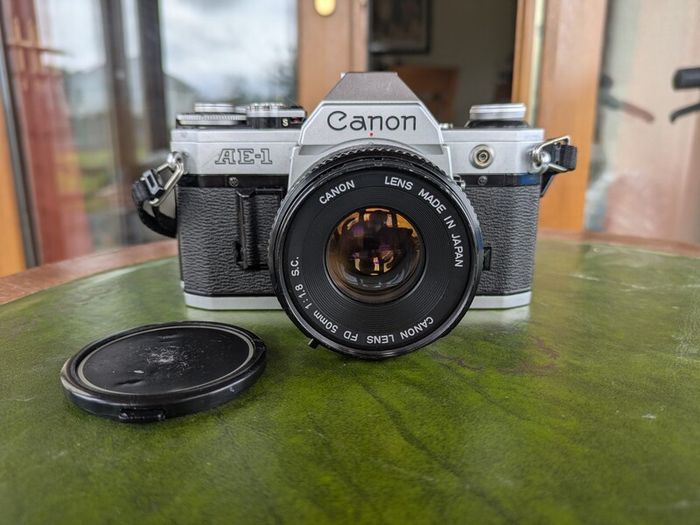 Canon AE-1 + FD 50mm f/1.8 + Tokina 28mm f/2.8