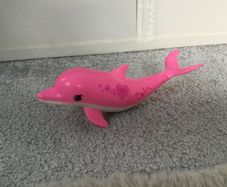 Barbie under water dolphin