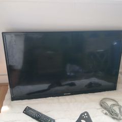 Walker brand flat screen tv 29inch in length  x17 inch heigth. Comes with original remot control, swivel mounted tv bracket and cables. .