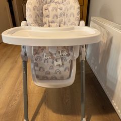 Adjustable baby high chair with rainbow pattern
