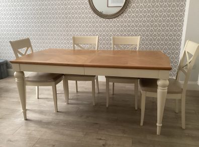 Extendable dining table with 6 chairs from hanley's