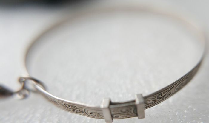 Vintage 925 Sterling Silver bangle with charm