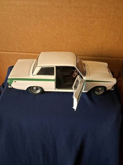 Model cars and bar signs